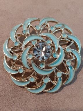 Gold-Tone Turquoise Enamel Floral Brooch with Central Crystal